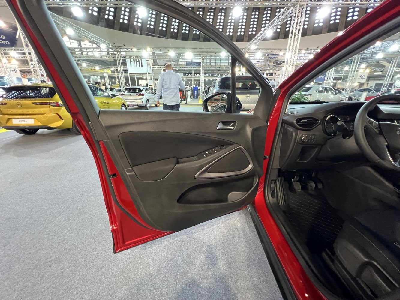 Interior door panel and dashboard controls with textured trim and window switches