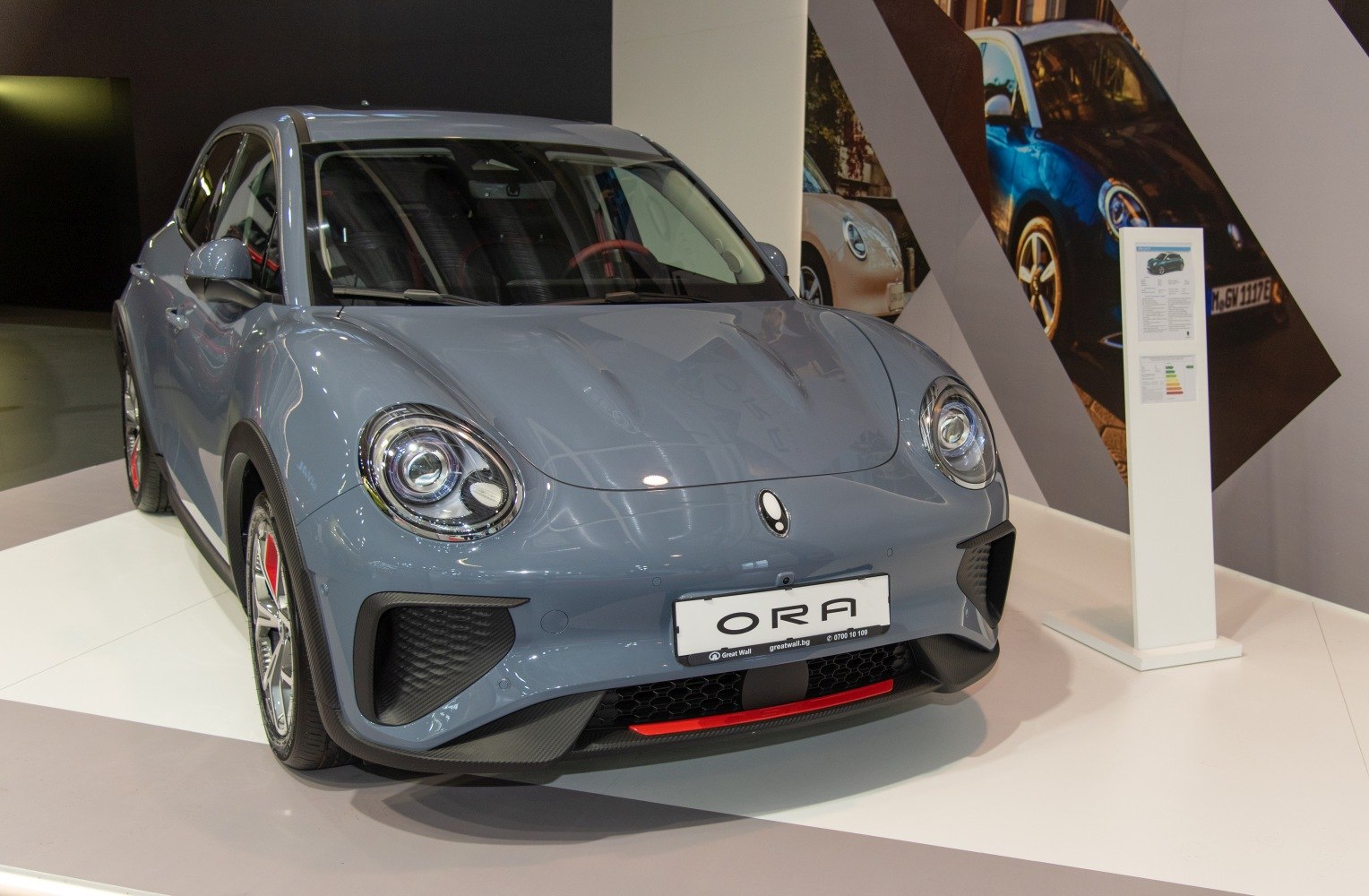 Front view with round LED headlights and aerodynamic bumper design