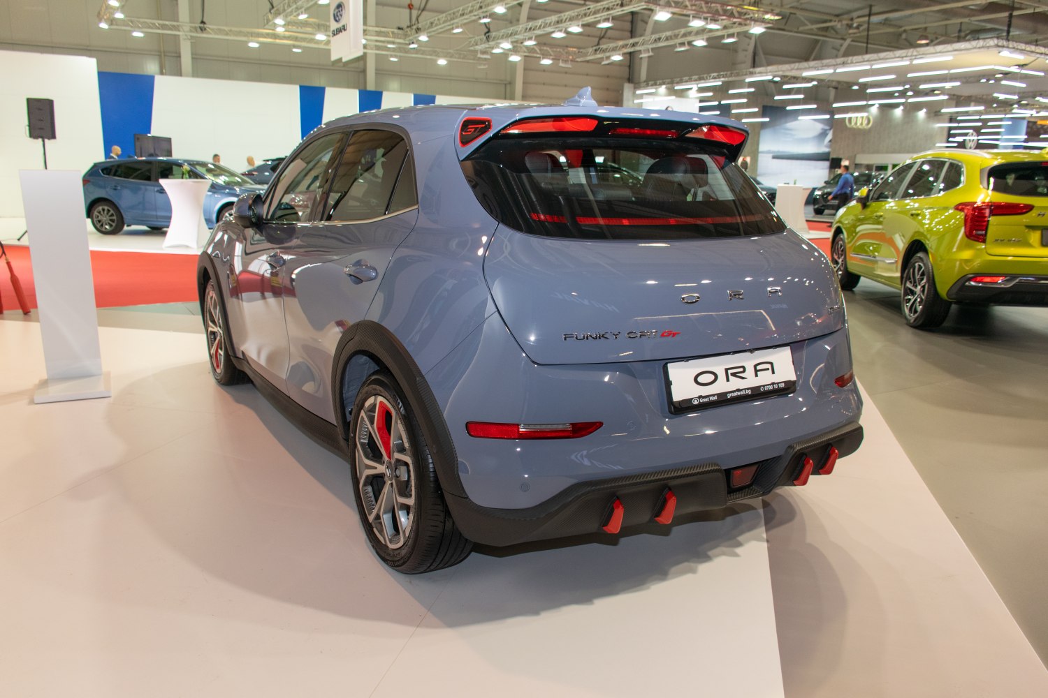 Rear view with sporty spoiler, unique diffuser, and distinctive tail lights