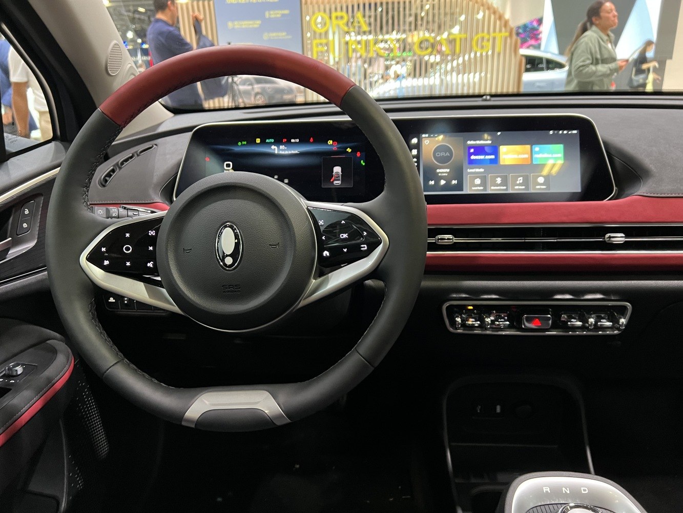 Digital instrument cluster and large infotainment touchscreen in car interior