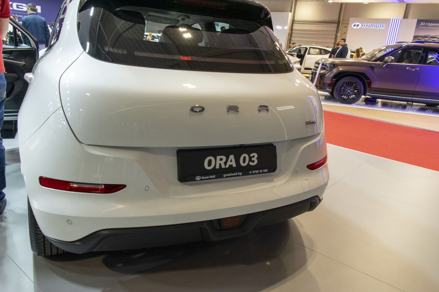 Rear view of a smooth, modern SUV with taillight and bumper details