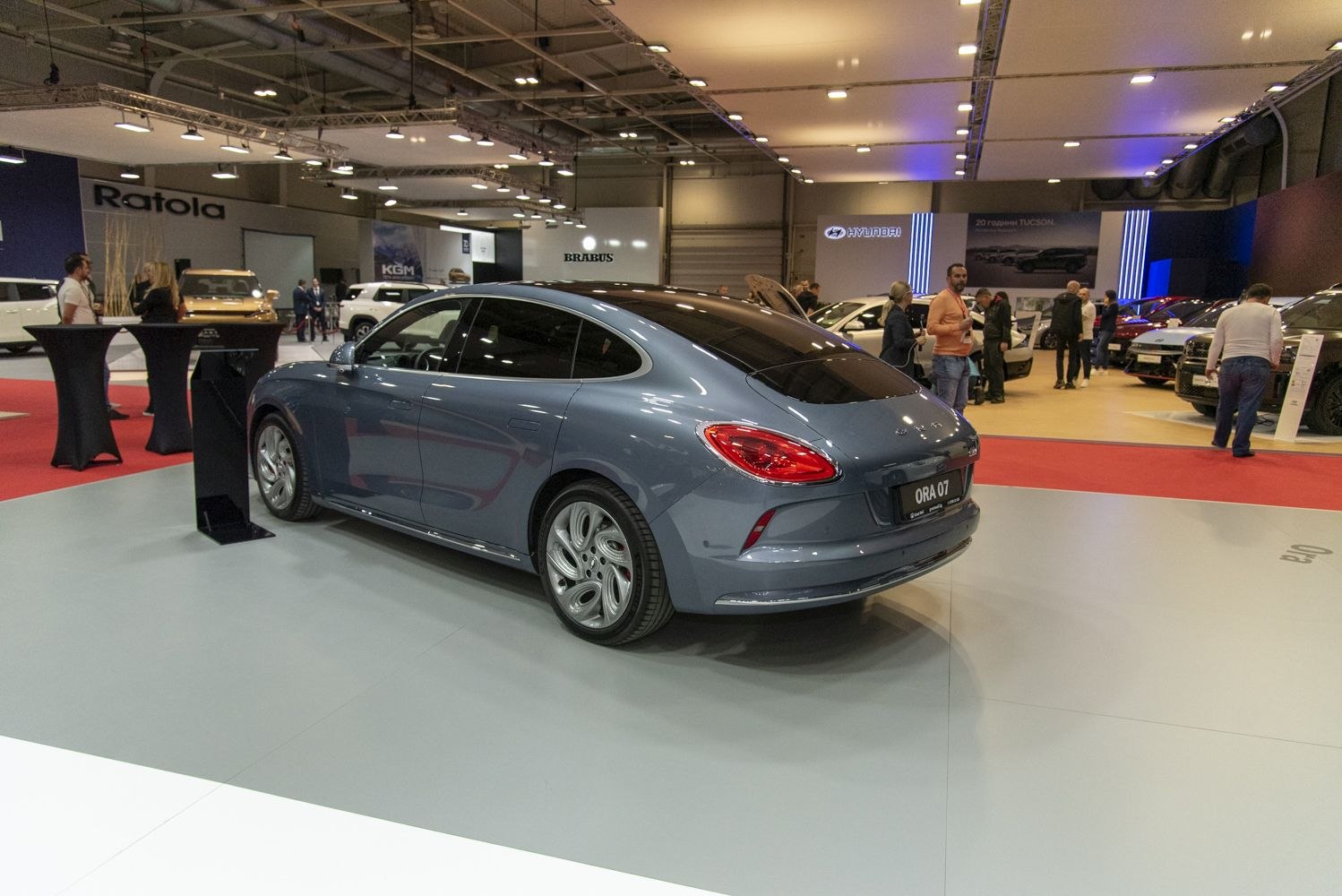 Aerodynamic rear design and distinctive alloy wheels of a sleek modern hatchback