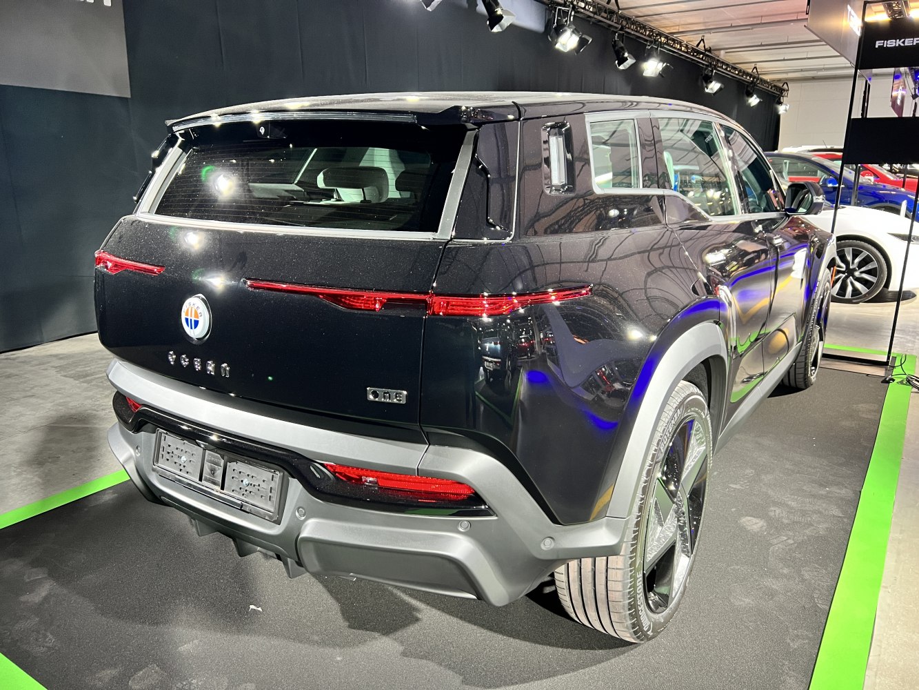 Rear and side view of a modern electric SUV with distinct taillights and robust bumper
