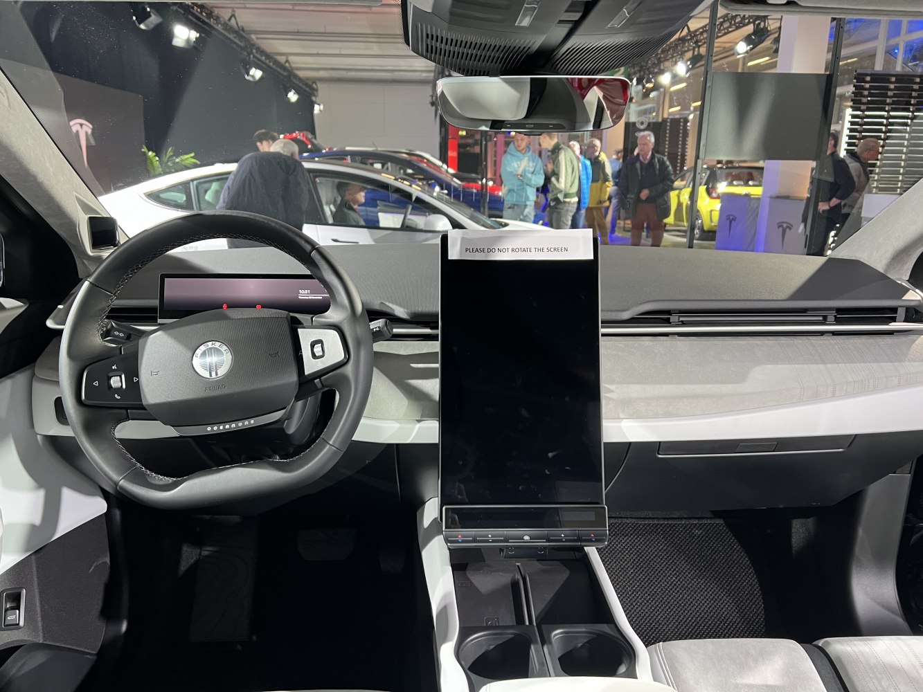 Digital driver dashboard and large vertical central touchscreen display