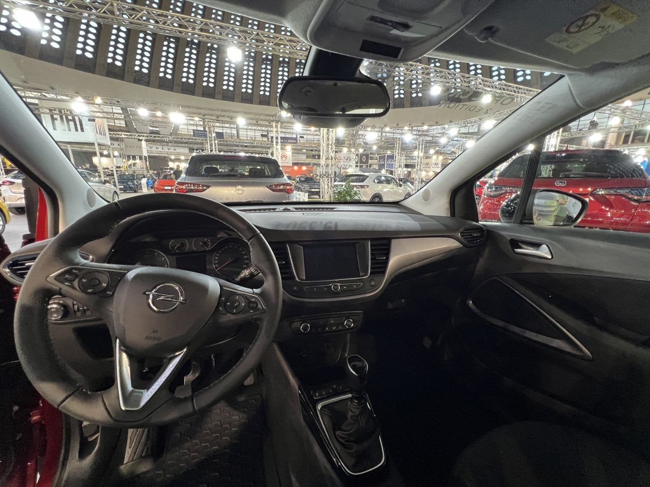 Dashboard, steering wheel, and gear shifter interior view