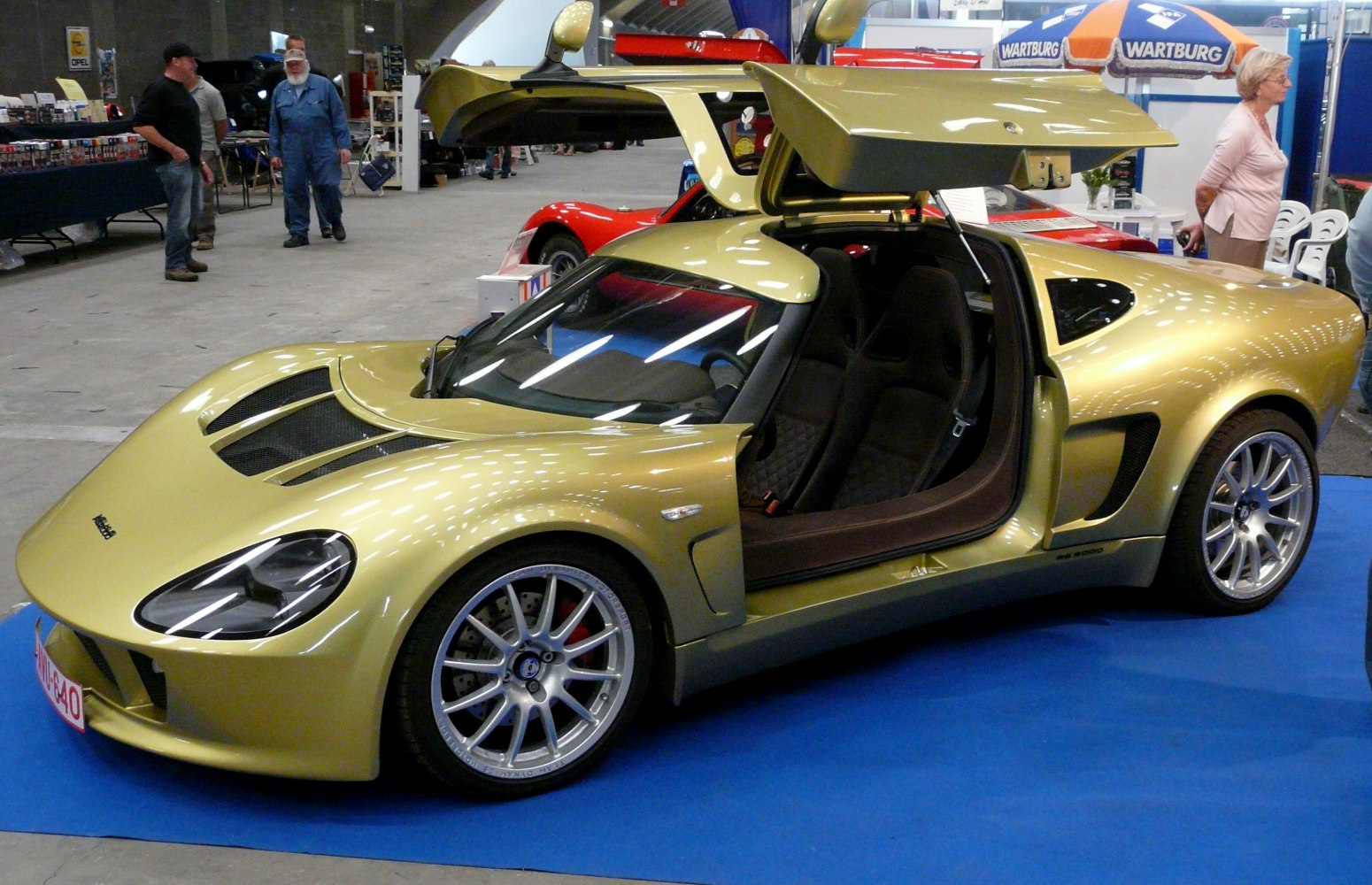 Mid-engine sports car with distinctive gullwing doors