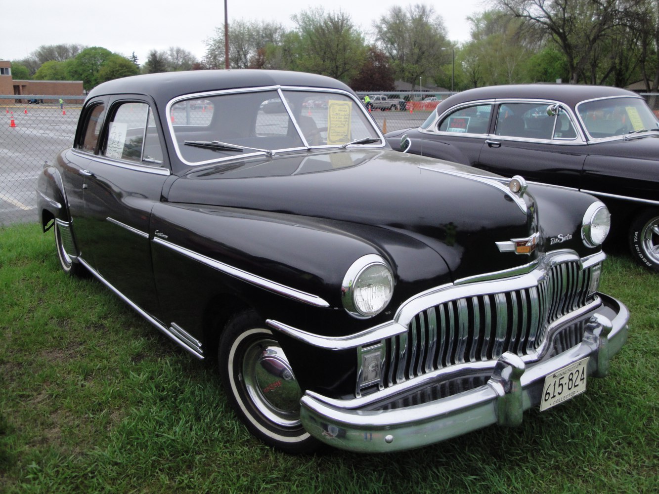 Classic 1949 coupe with large chrome grille and round headlamps