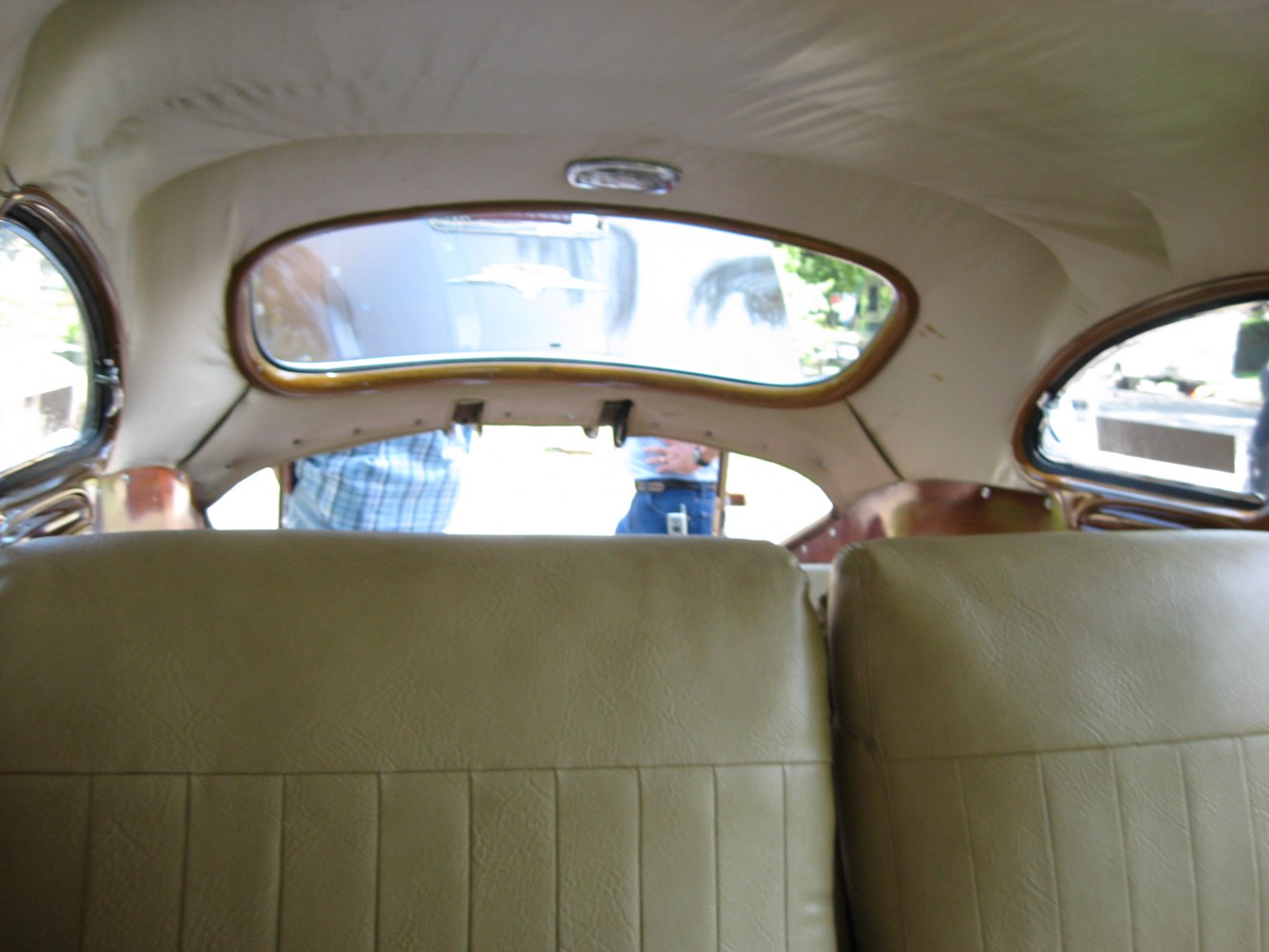 Interior rear seating and distinctive curved windows