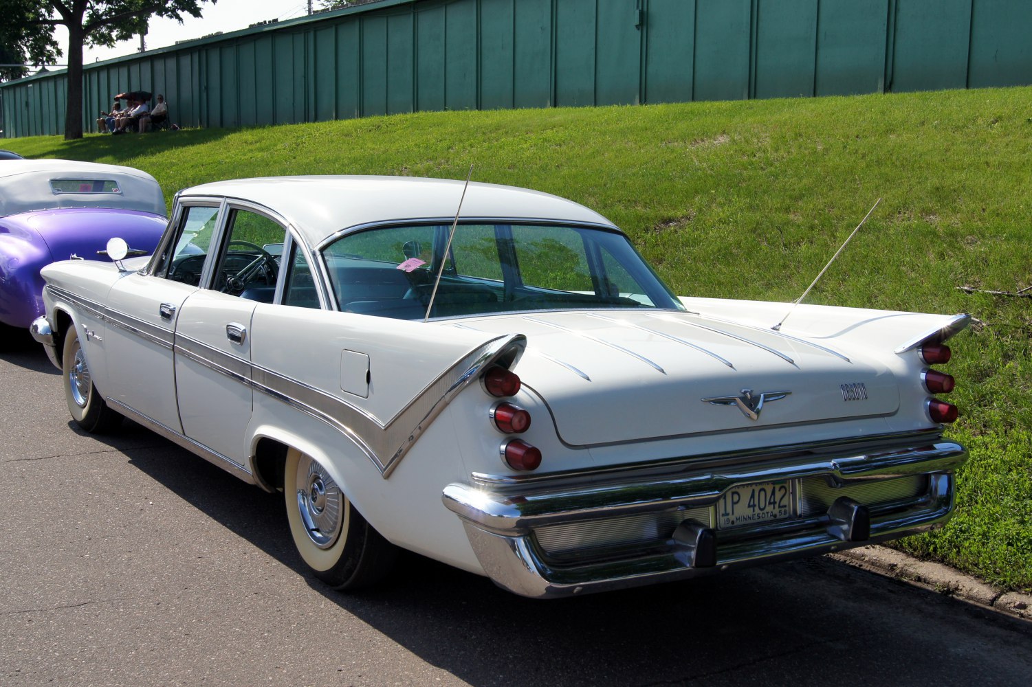 Rear view with classic tail fins and triple taillight clusters