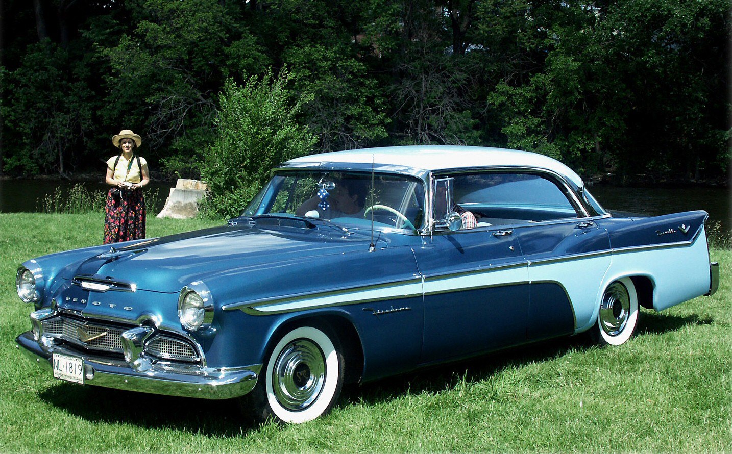 Four-door hardtop with two-tone blue paint and whitewall tires