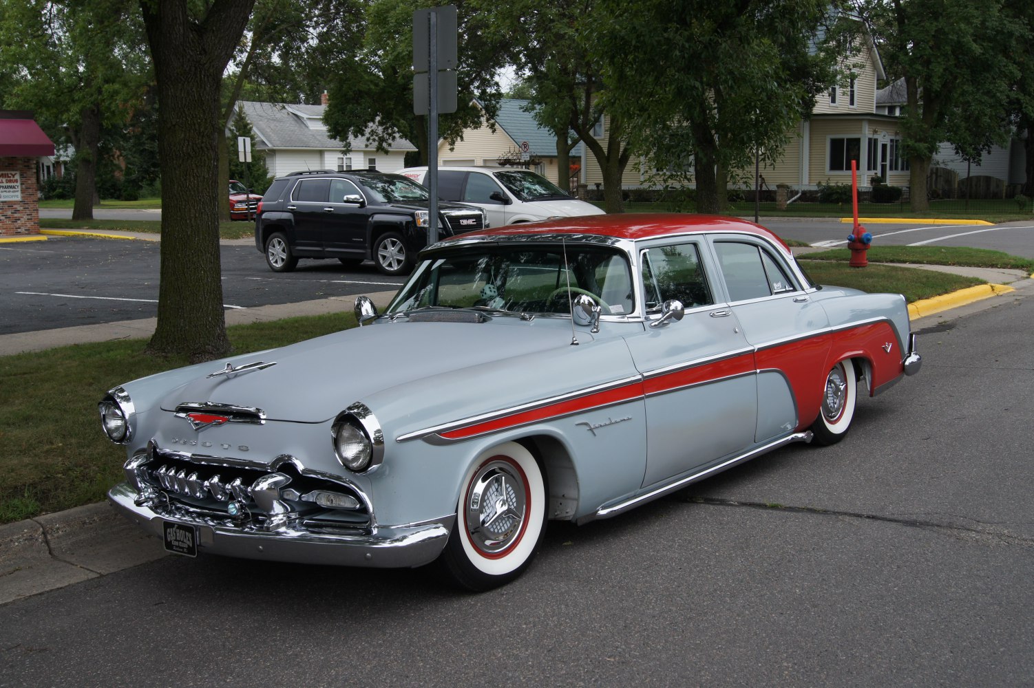 Lowrider sedan with two-tone paint and chrome grille