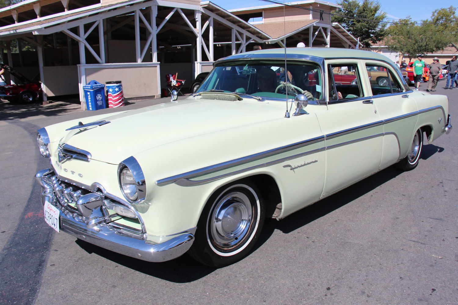 Classic four-door sedan with chrome bumper and rounded headlights