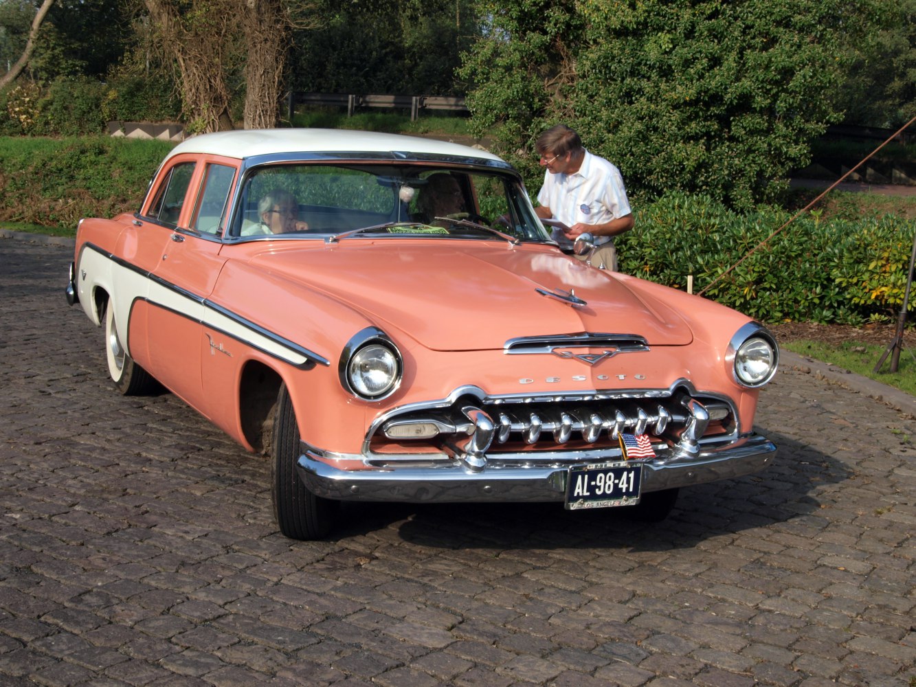 1950s sedan with chrome grille and two-tone paint