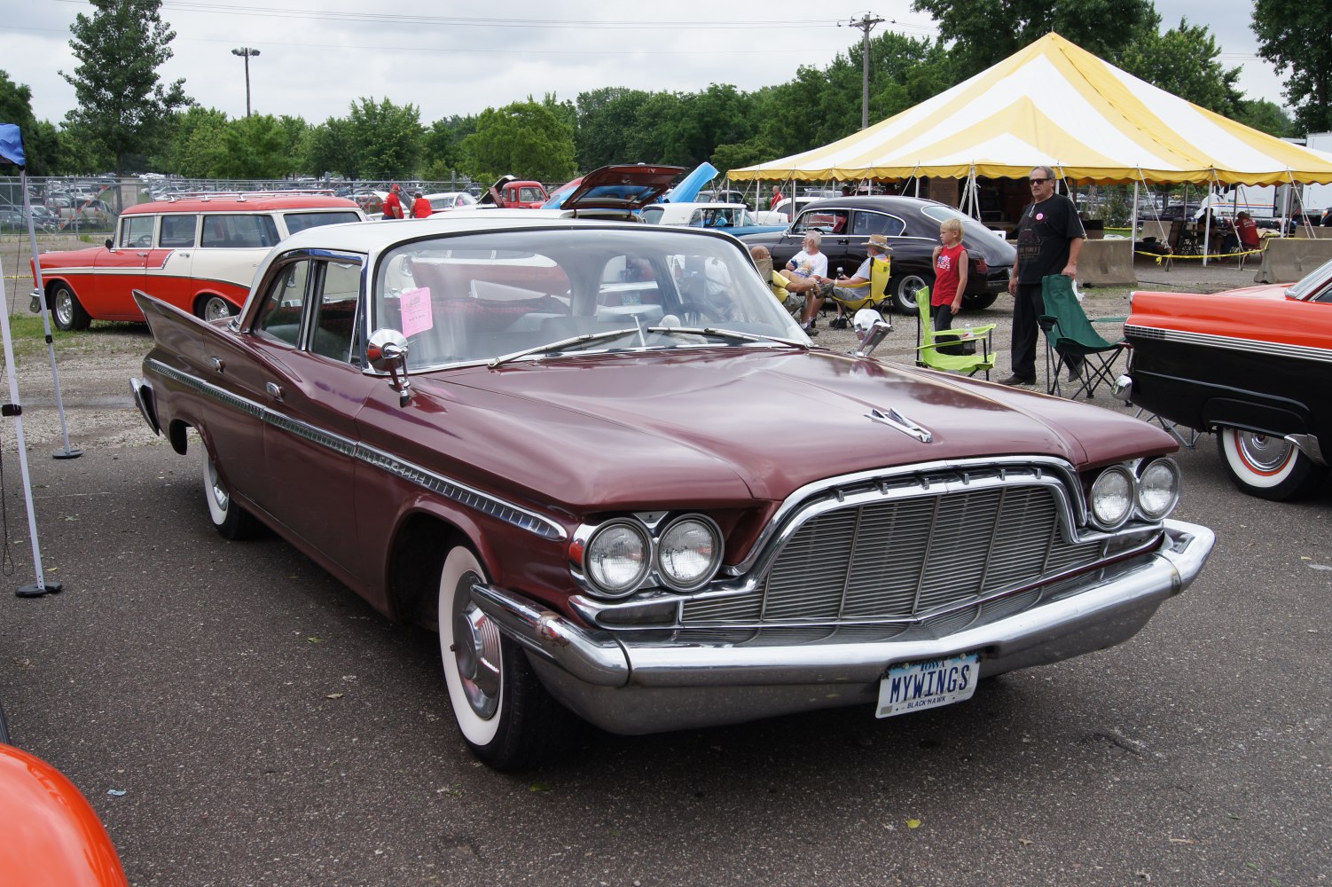 Classic 1960 sedan with dual headlights and wide chrome grille
