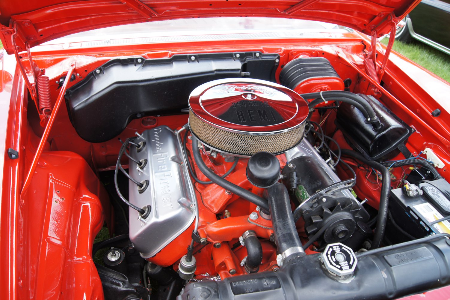 V8 FirePower engine with chrome air filter in red engine bay