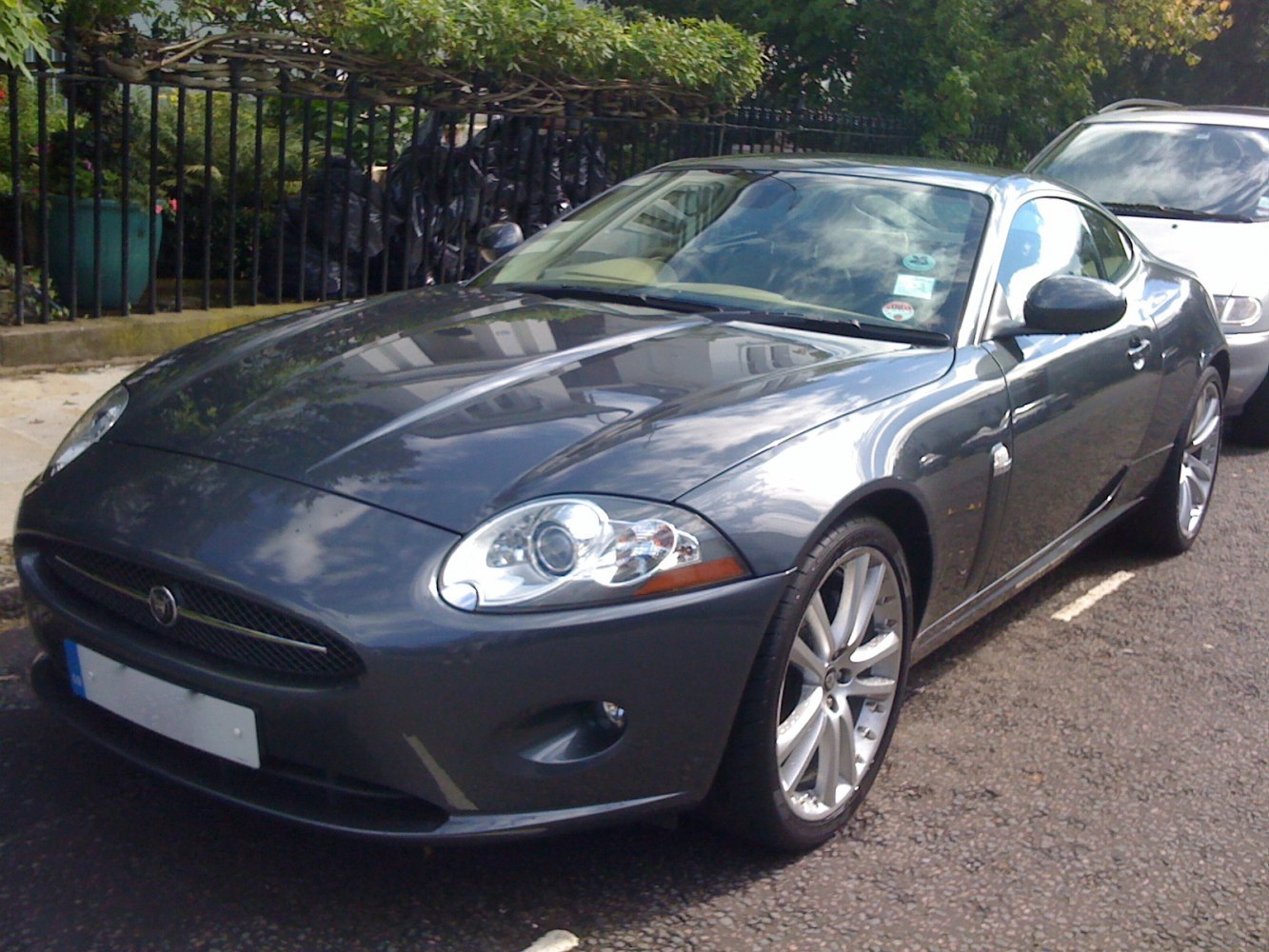 Front three-quarter view of a sleek sports coupe with alloy wheels