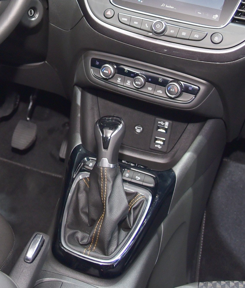Gear shift lever and climate control panel with USB ports in car interior