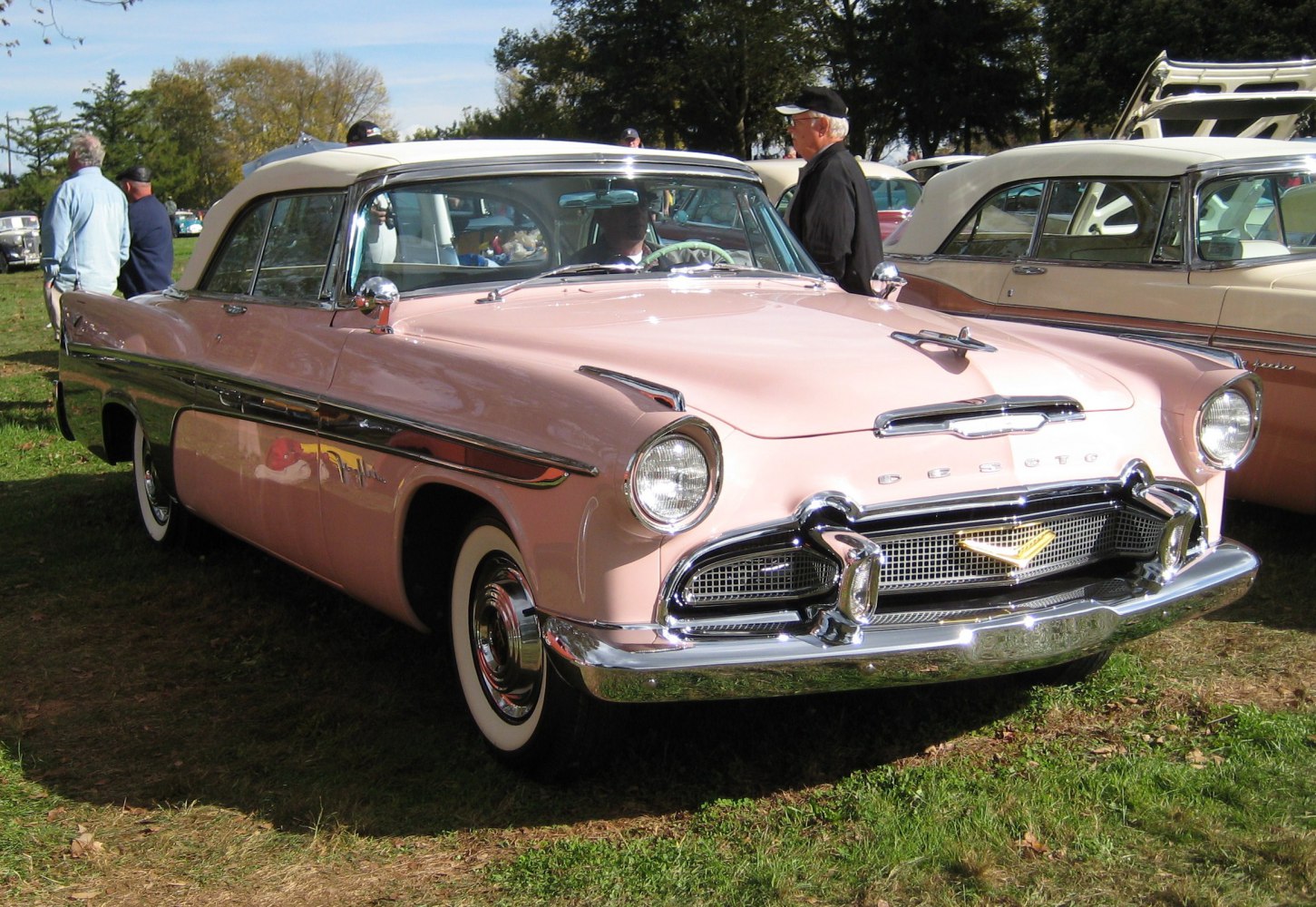 Convertible with chrome details, whitewall tires, two-tone soft top