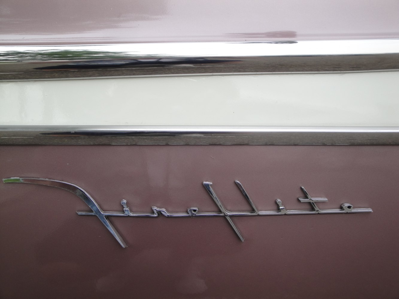 Chrome Fireflite script emblem and trim detail