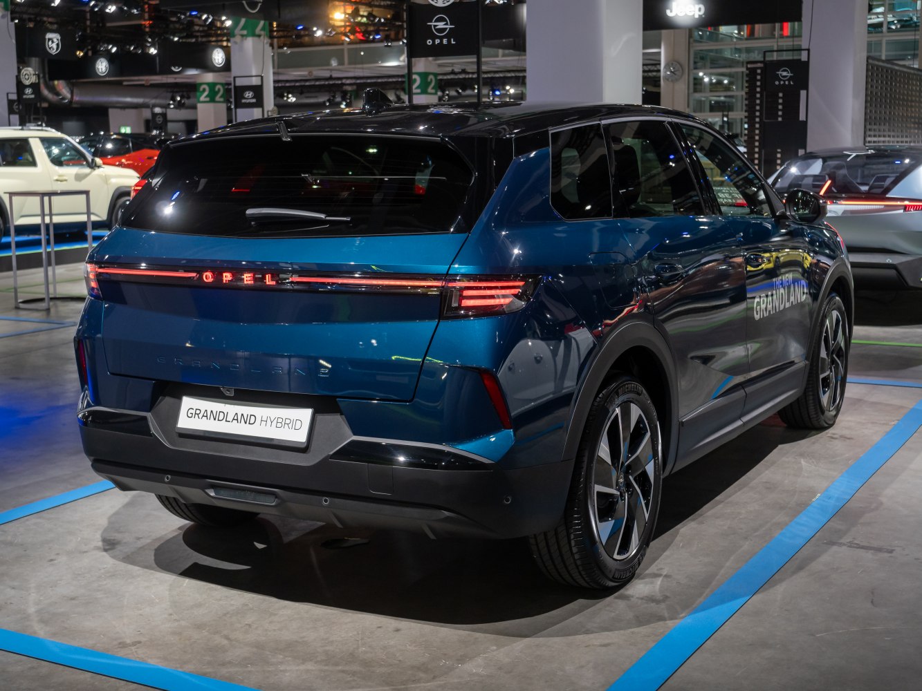 Rear view of hybrid SUV with LED tail light bar and sporty design