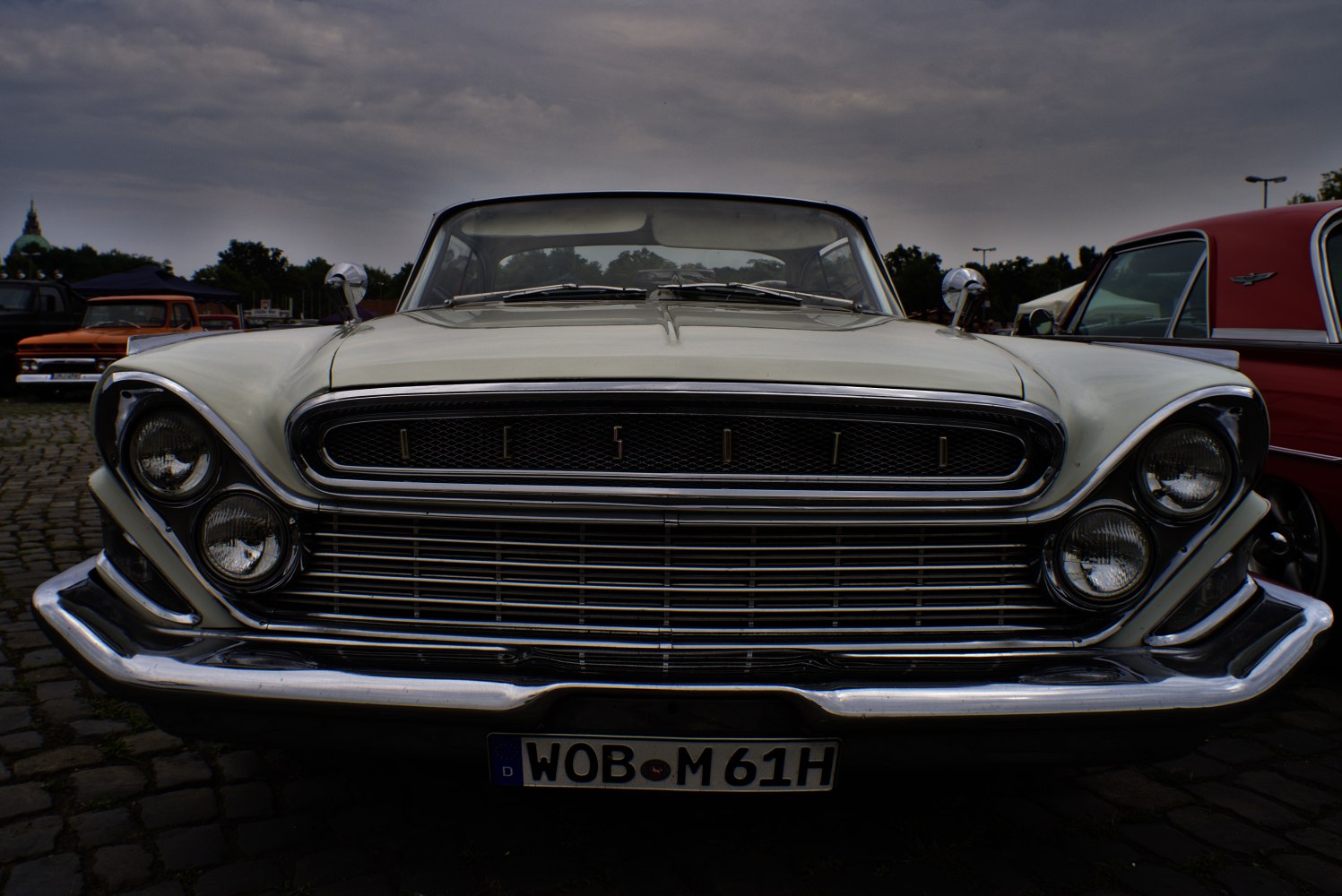 Front view with distinctive grille and quad headlights