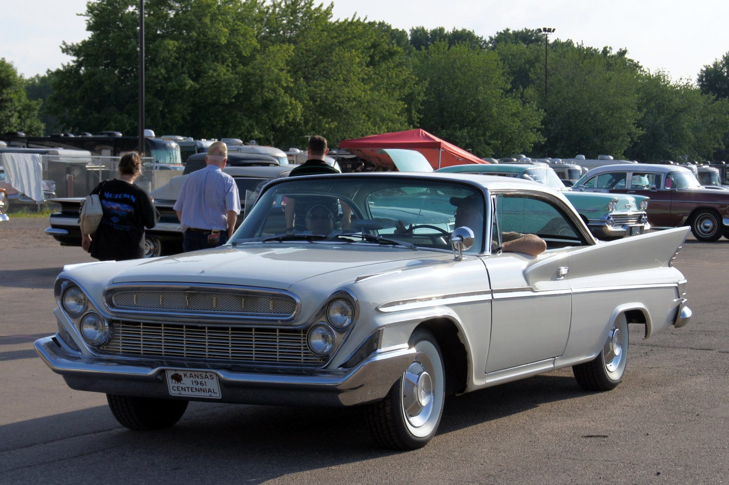 Vintage 2-door hardtop with bold tailfins and dual front headlights