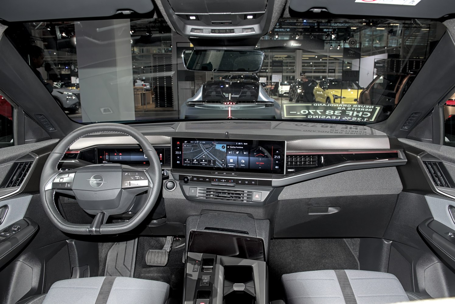 Digital cockpit and steering wheel in modern car interior