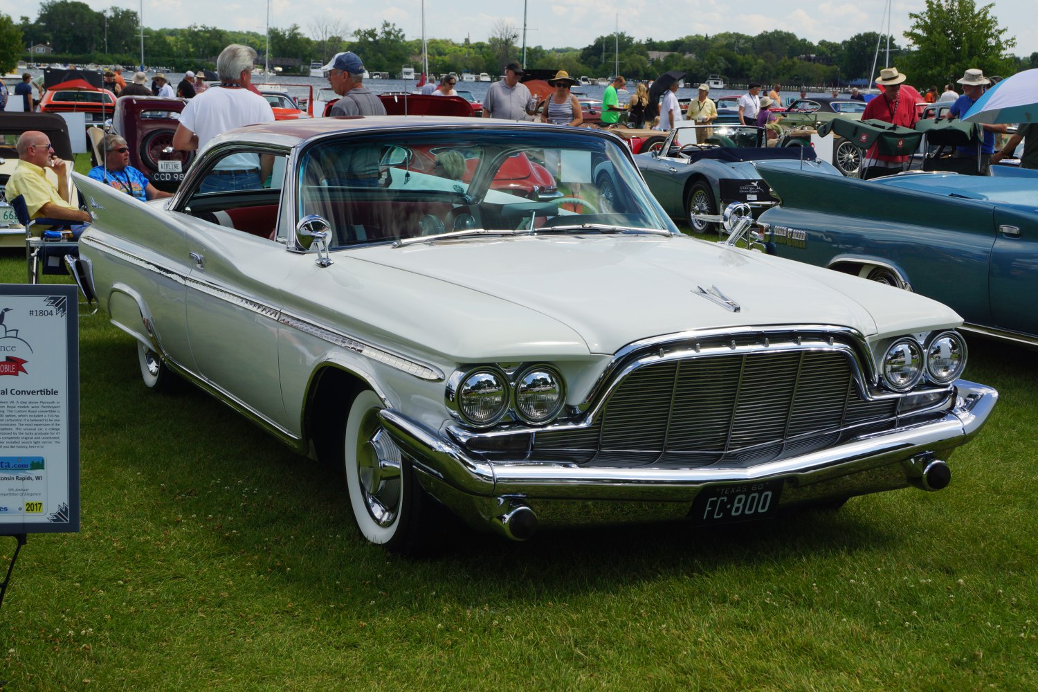Vintage 2-door hardtop with dual round headlights and chrome front grille