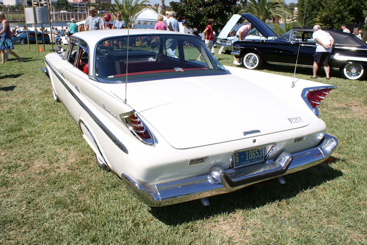 4-door sedan with distinctive tail fins and chrome bumper