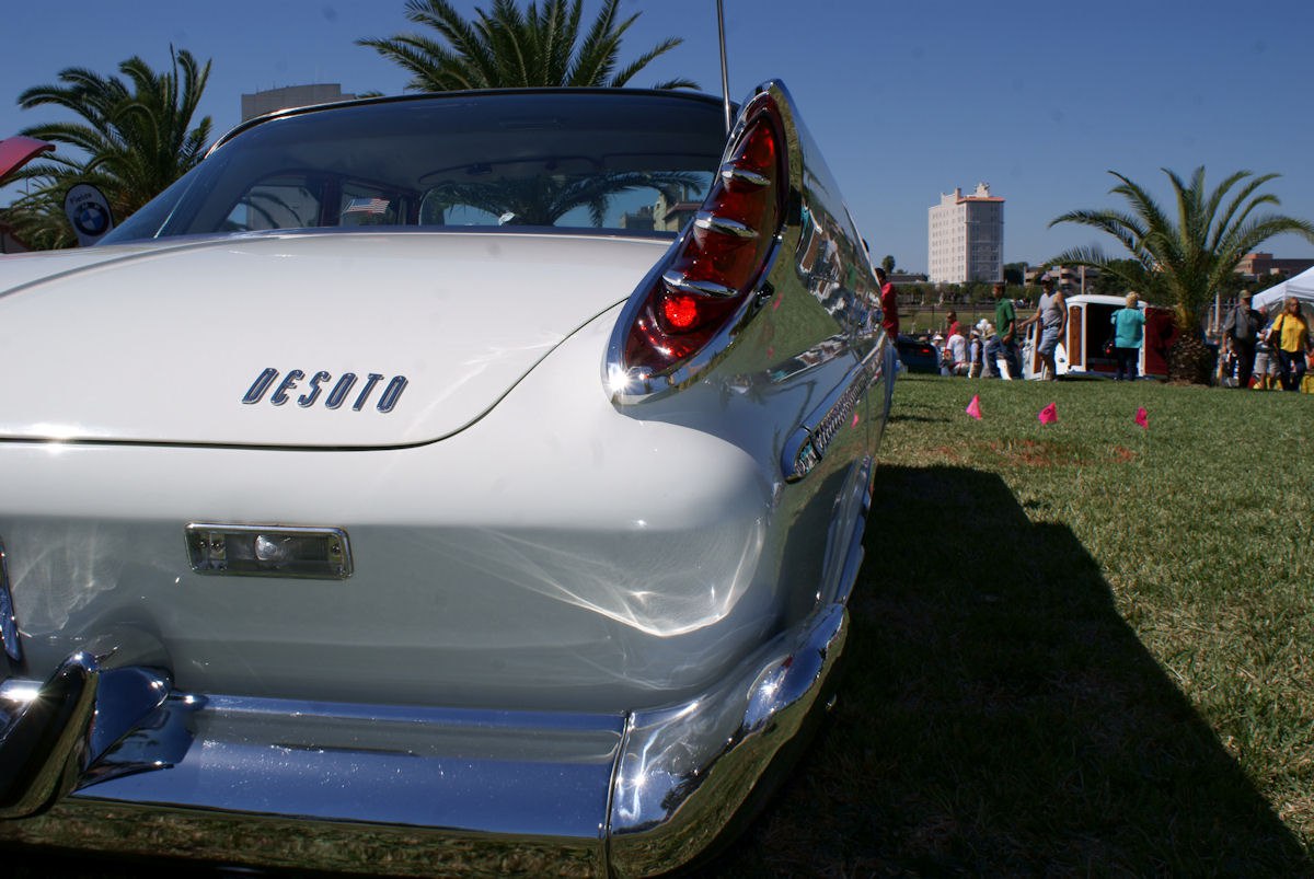 Rear view featuring classic tailfins and chrome bumper