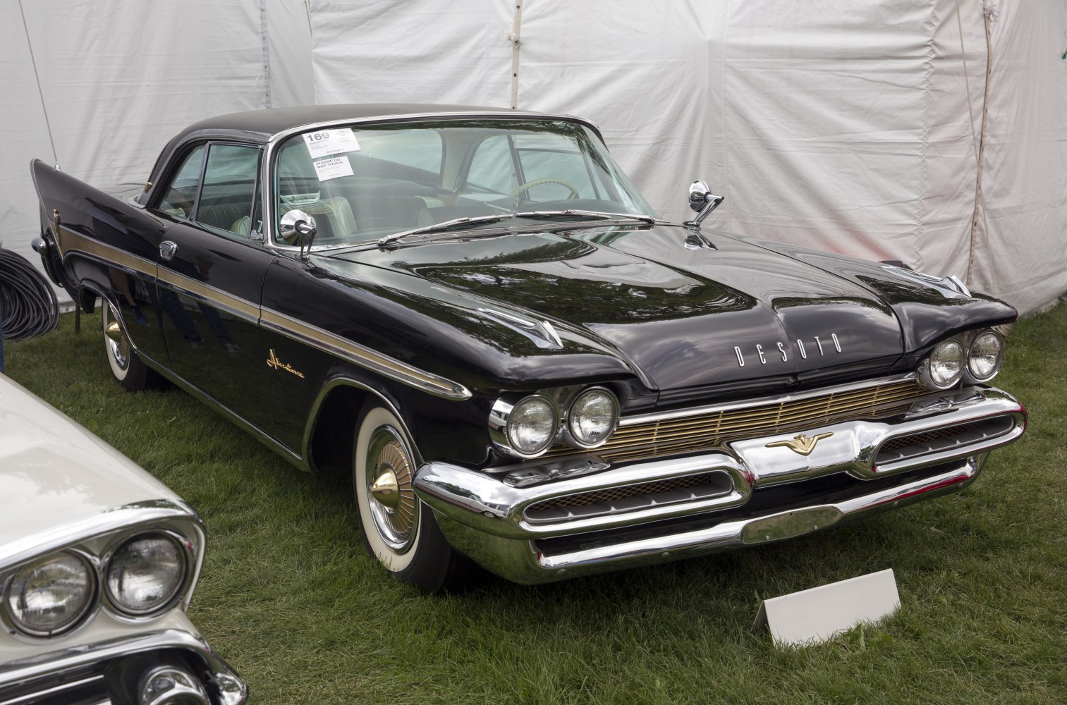 Vintage coupe with quad headlights and chrome front grille