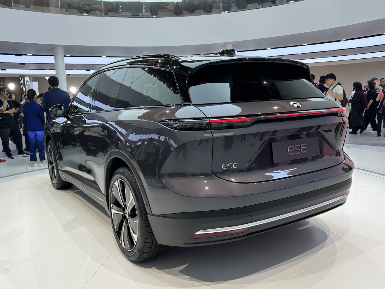Rear view of modern SUV with LED tail light strip and aerodynamic design