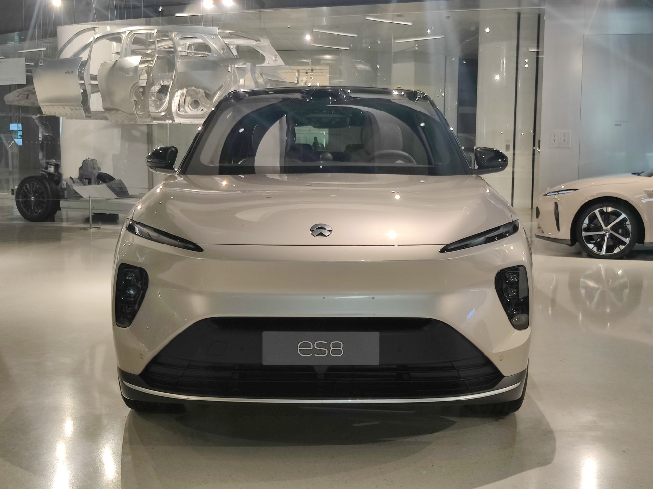 Front view of SUV with slim LED headlights and distinctive bumper design