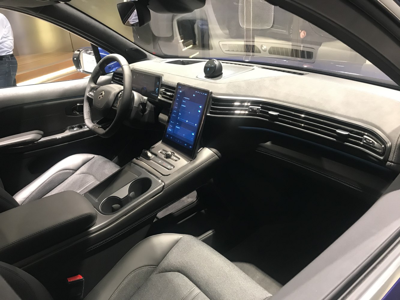 Modern car interior with dual digital displays and sleek dashboard design