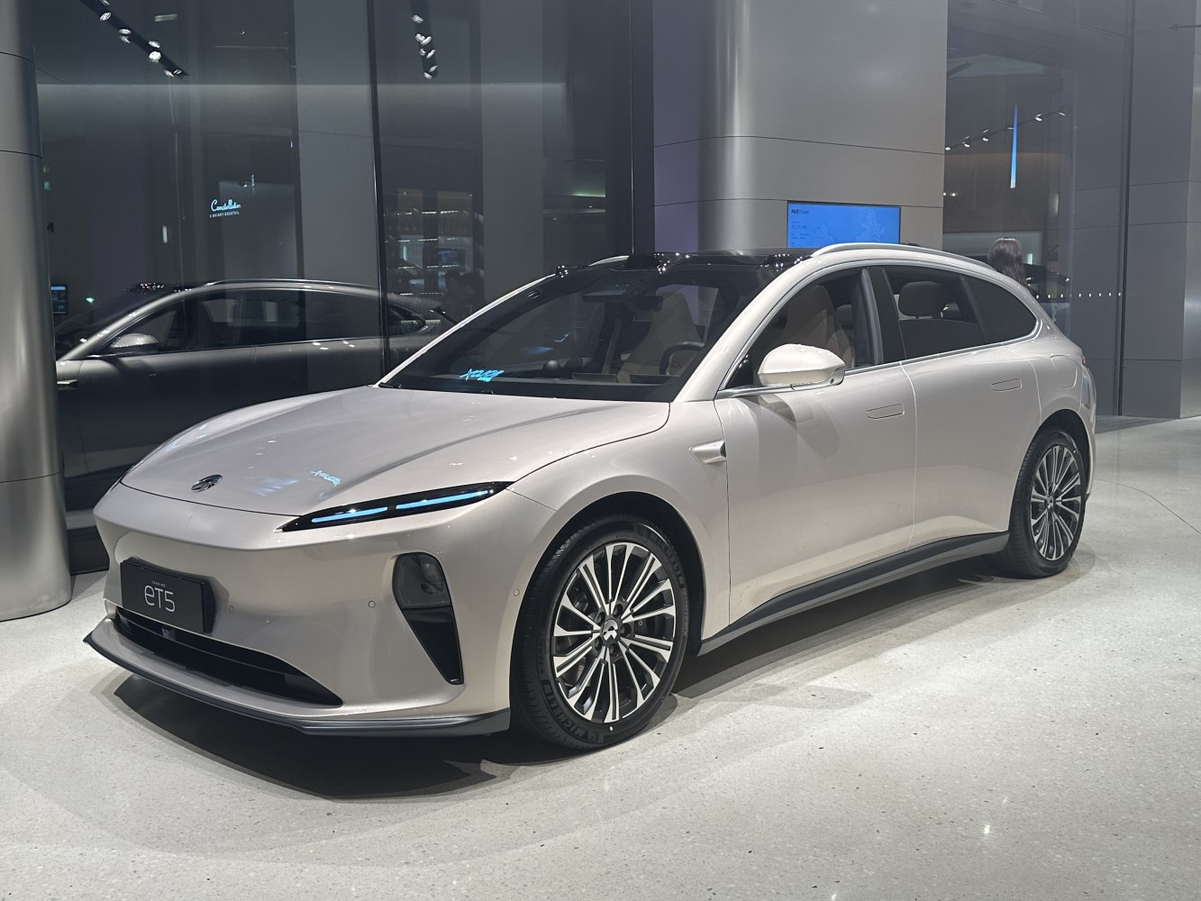 Front-side view of sleek electric station wagon with LED headlights