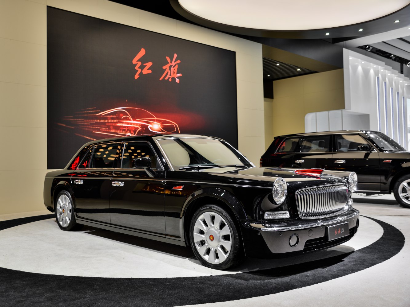 Luxury sedan with vintage grille and round headlights