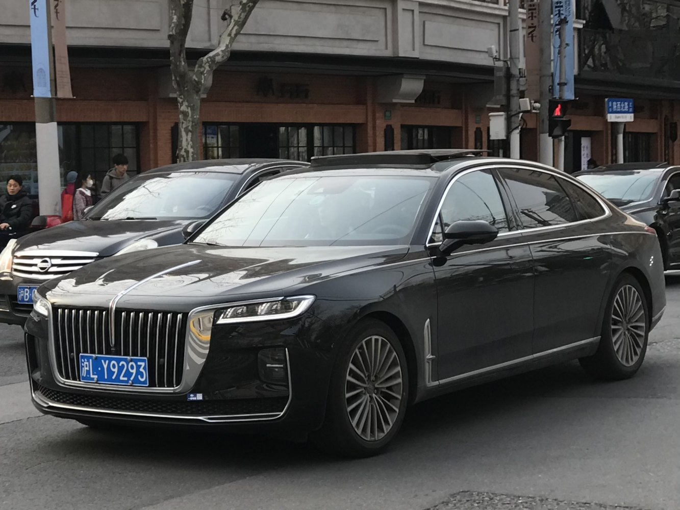 Luxury sedan with large vertical grille and LED headlights