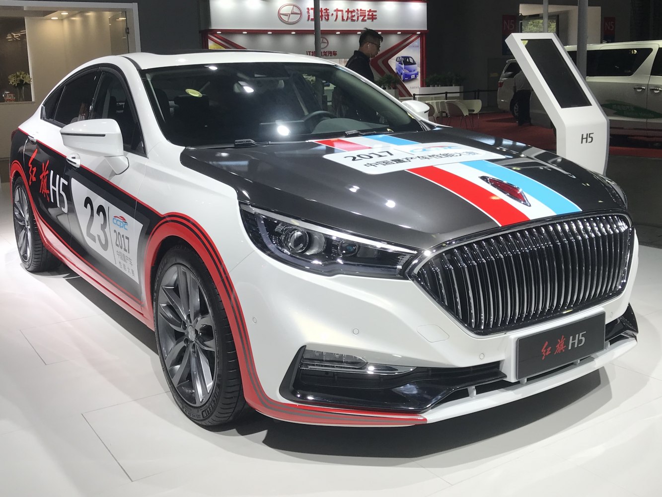 Front and side view with racing decals and large grille