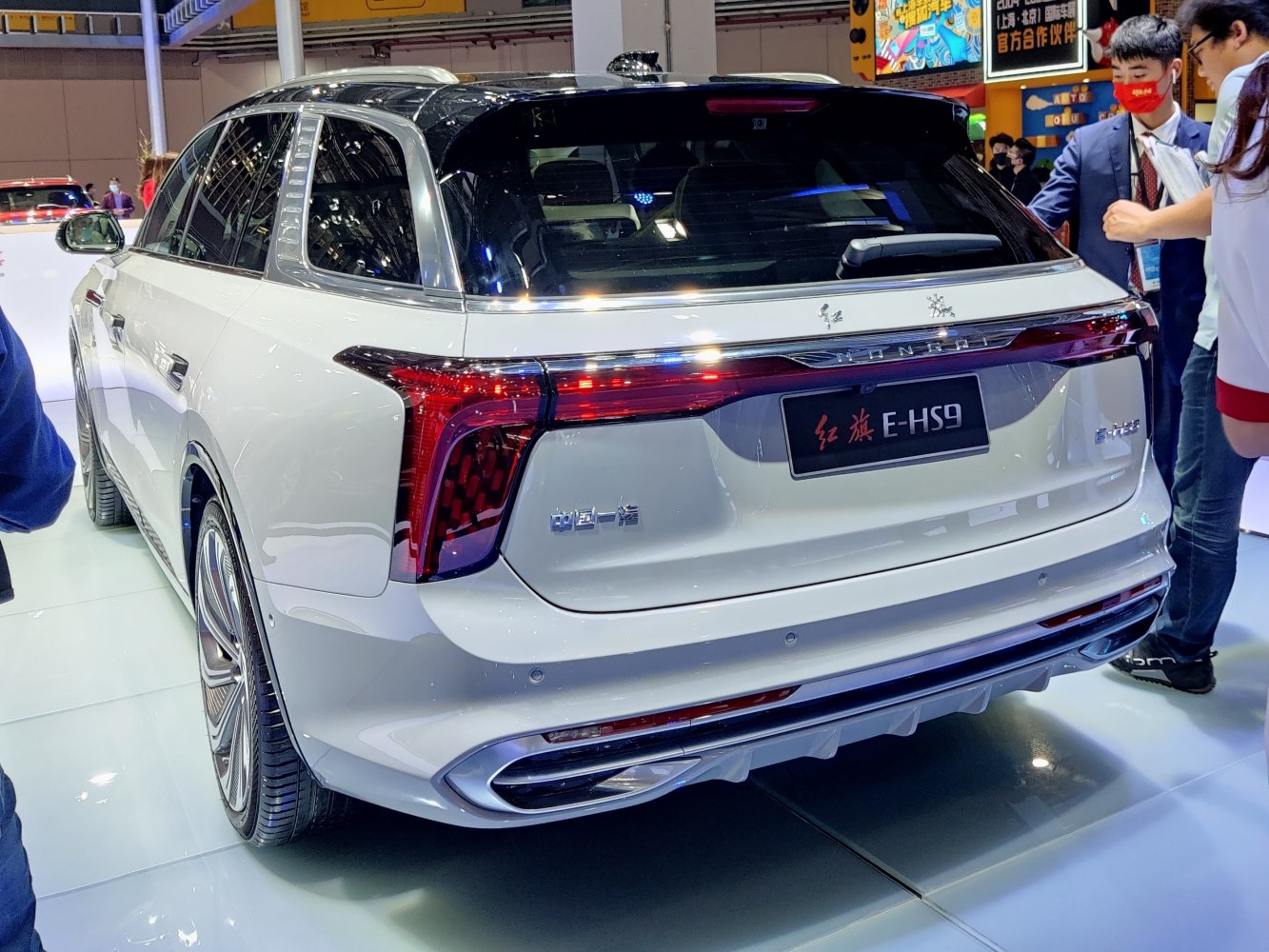 Rear view of a luxury SUV with distinct tail lights and two-tone roof