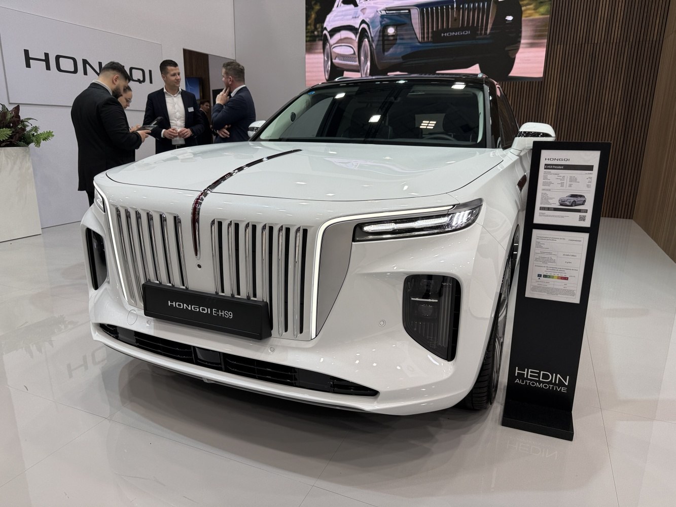 Vertical grille and sleek LED headlights on luxury SUV front