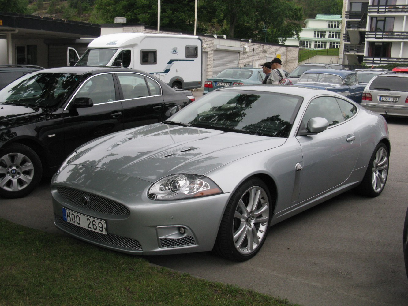 Silver coupe with sporty front and alloy wheels