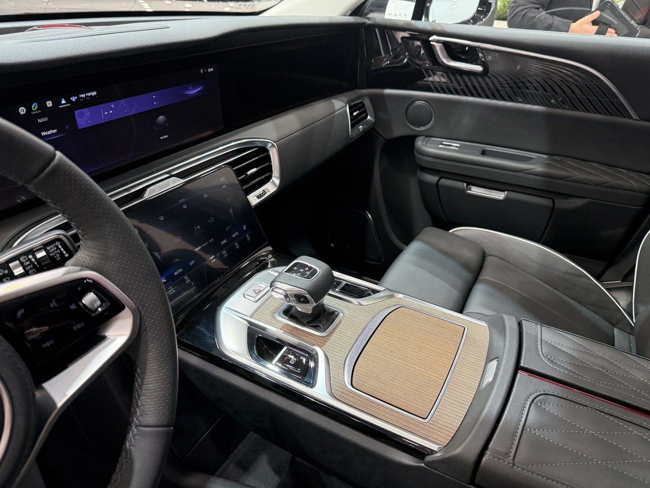 Digital dashboard and touchscreen center console with luxury interior trim