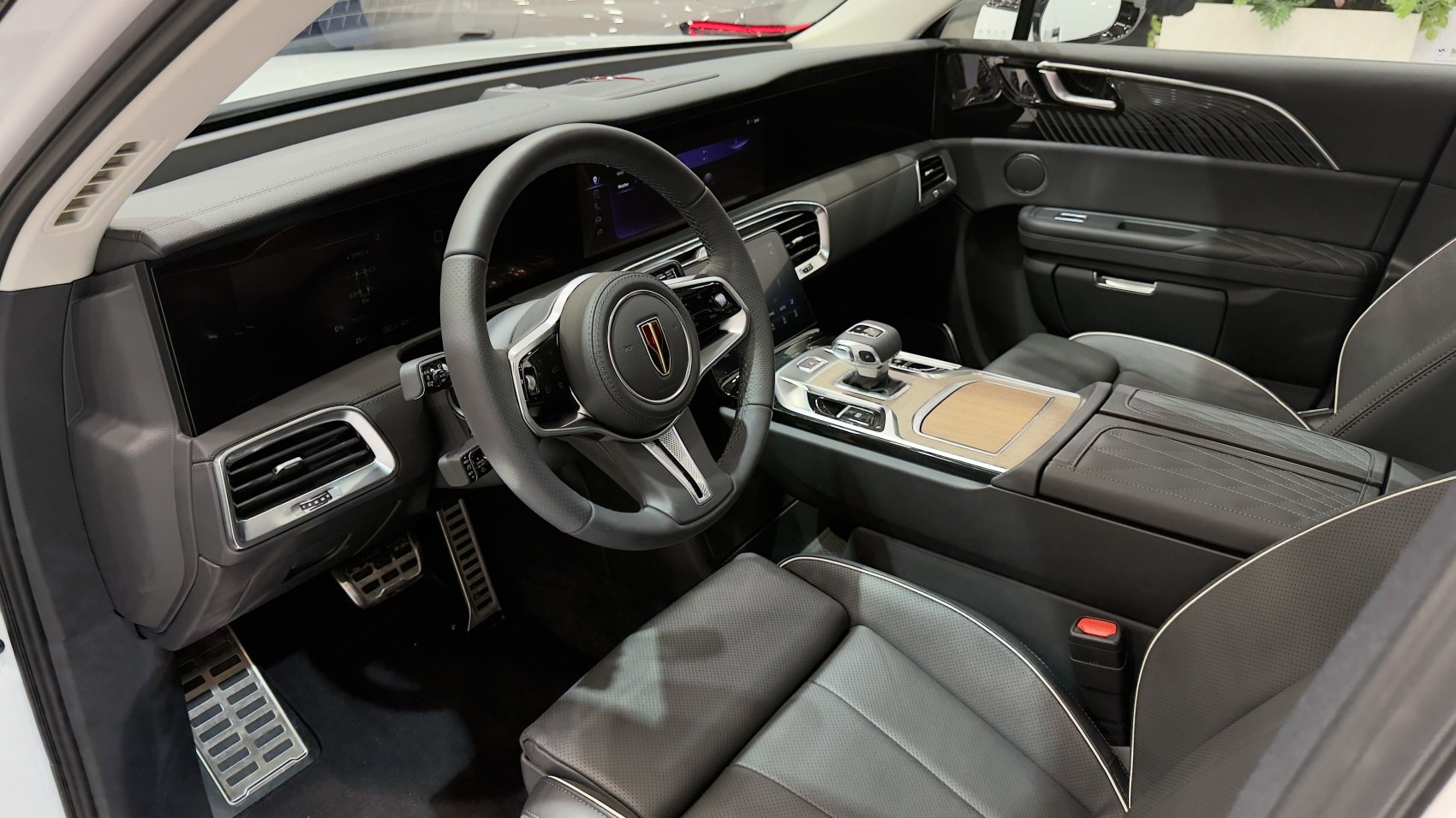 Luxury SUV interior with leather seats and digital dashboard