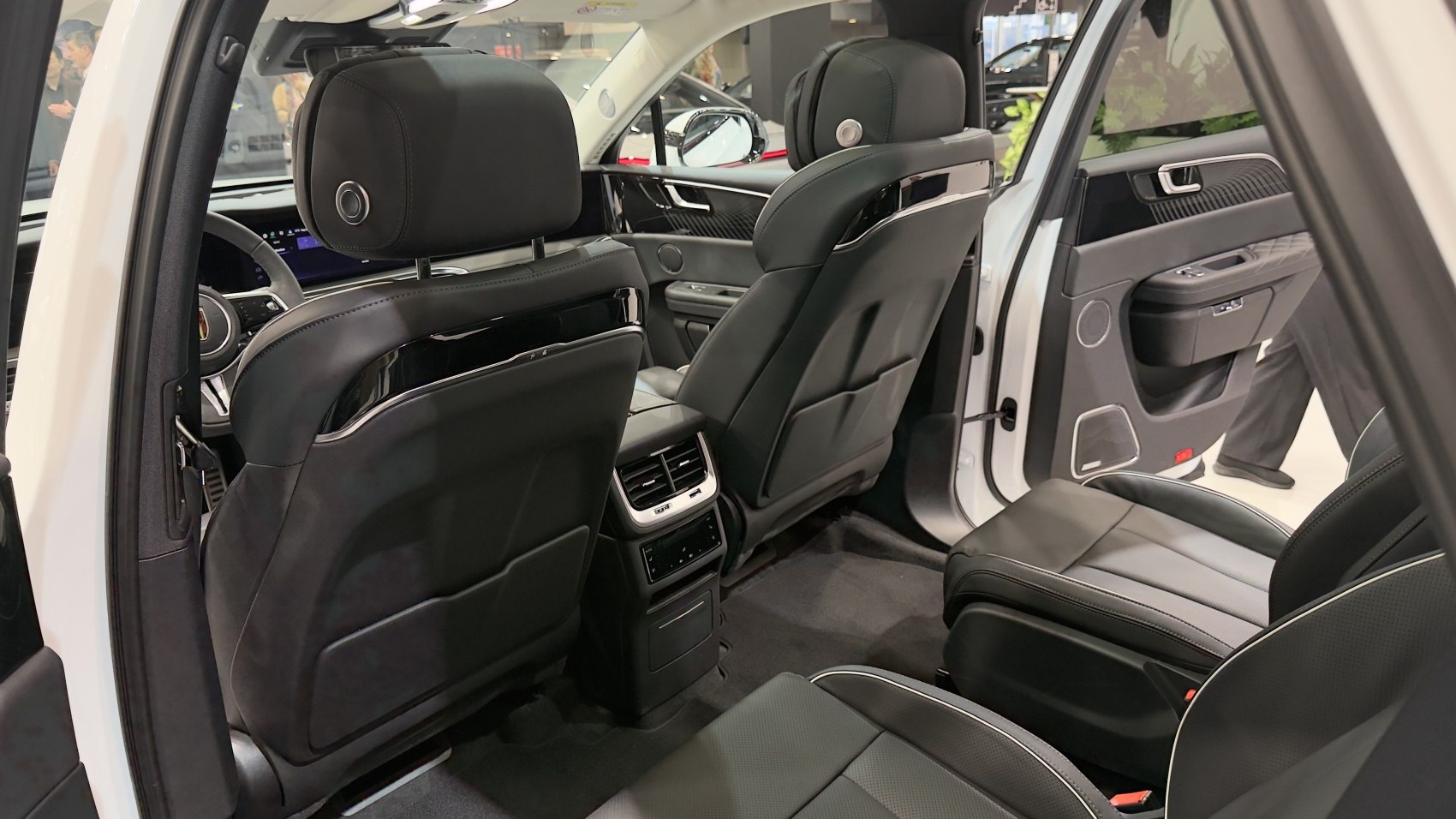 Luxurious black leather rear seats with rear air vents and advanced interior trim.