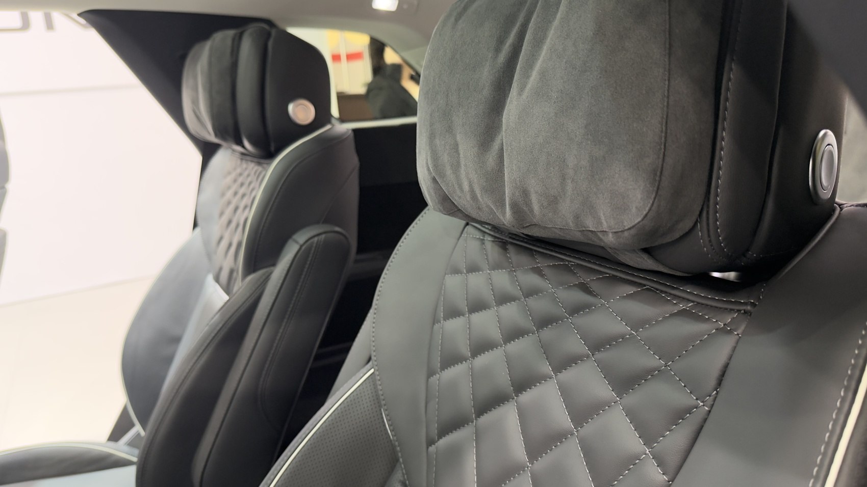Quilted leather seats with plush adjustable headrests