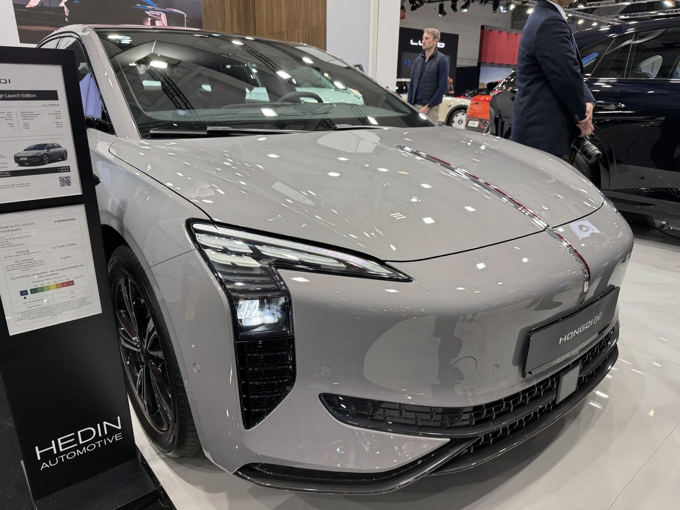 Sleek aerodynamic front with futuristic LED headlights