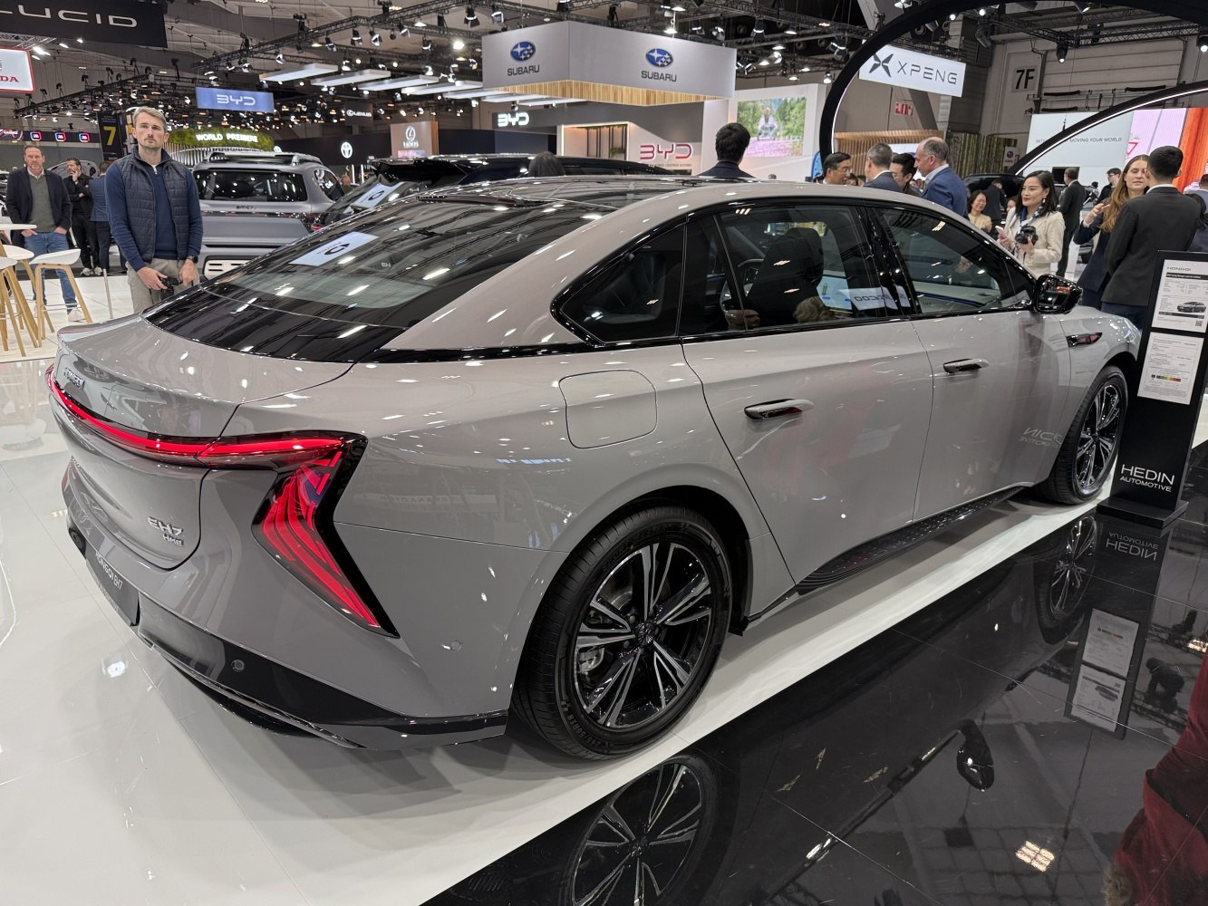 Rear side profile with angular LED tail lights on electric sedan