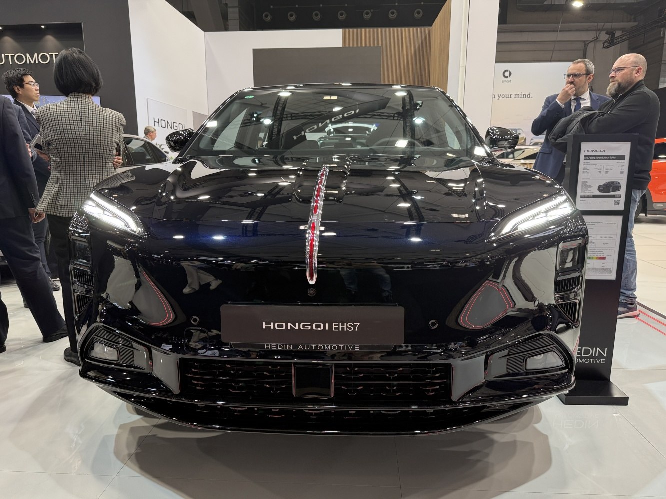 Front view with LED headlights and bold grille design