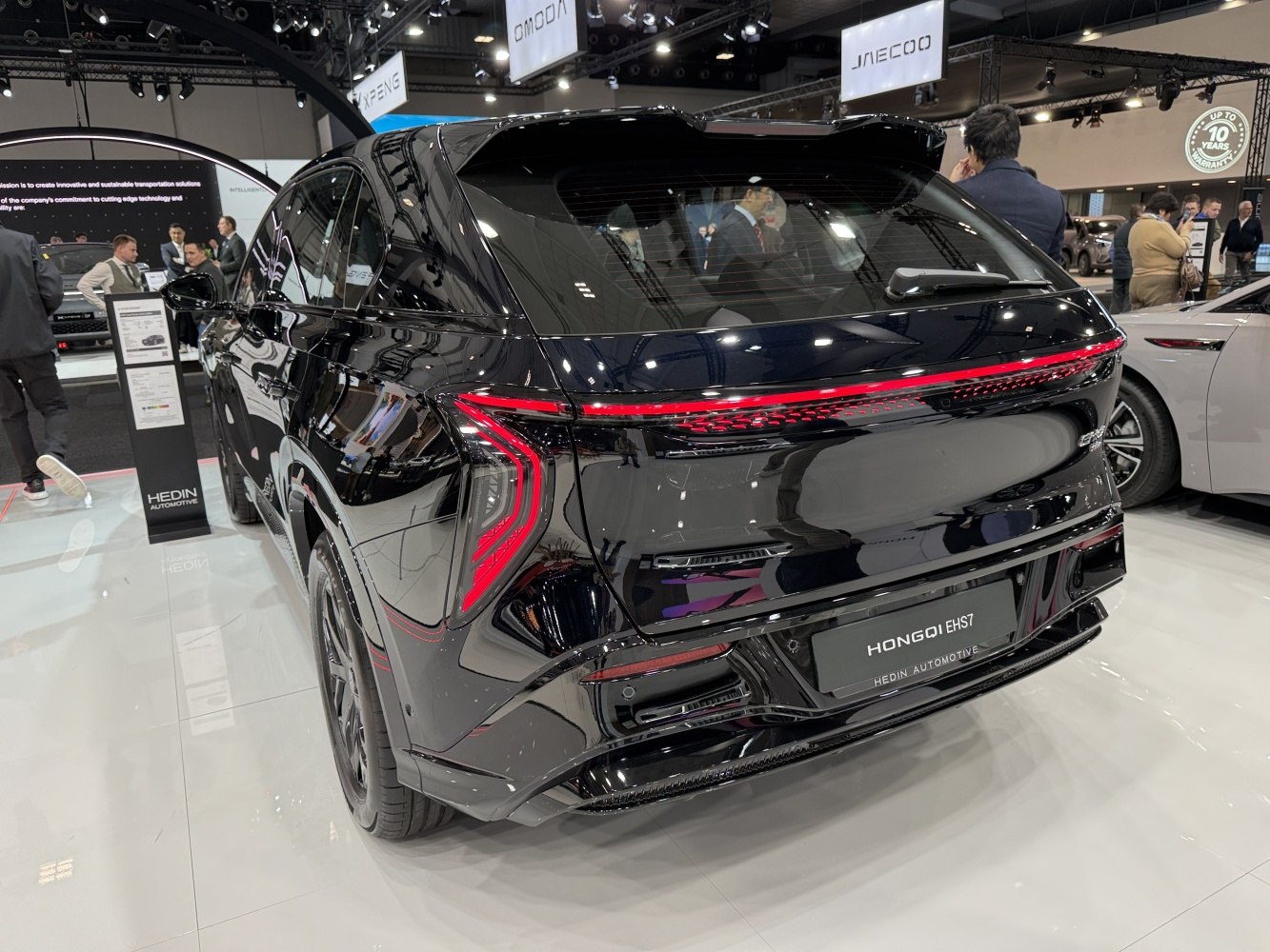 Sleek SUV rear with sharp LED taillights and spoiler