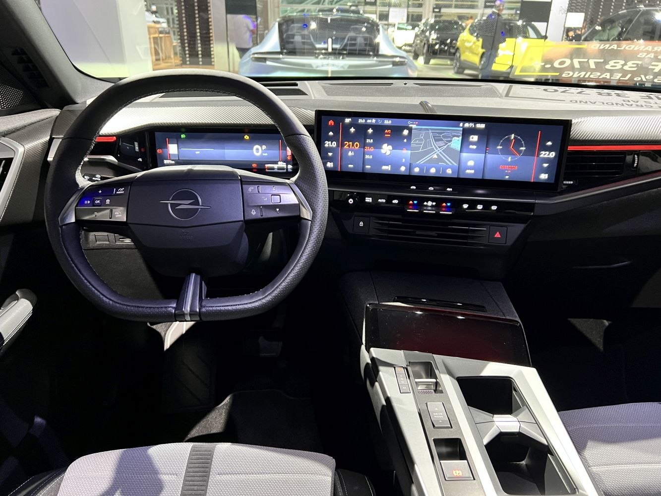 Digital dashboard and wide infotainment screen in a modern car interior